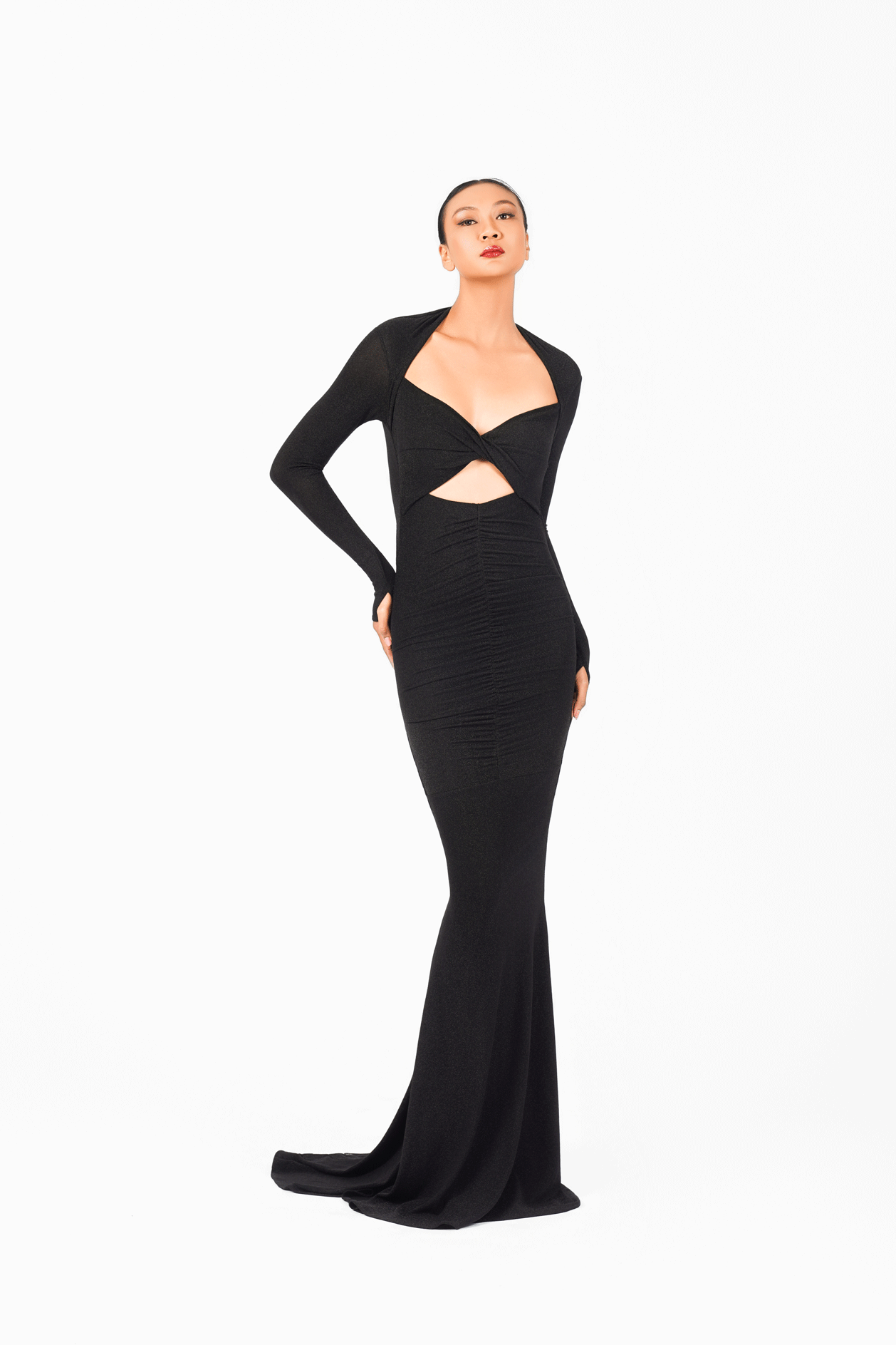 black dress with open chest Black mermaid dress featuring bold white piping that traces an open slit running from the skirt up to the chest, curving along the waist side. The design includes an open side detail and is accented